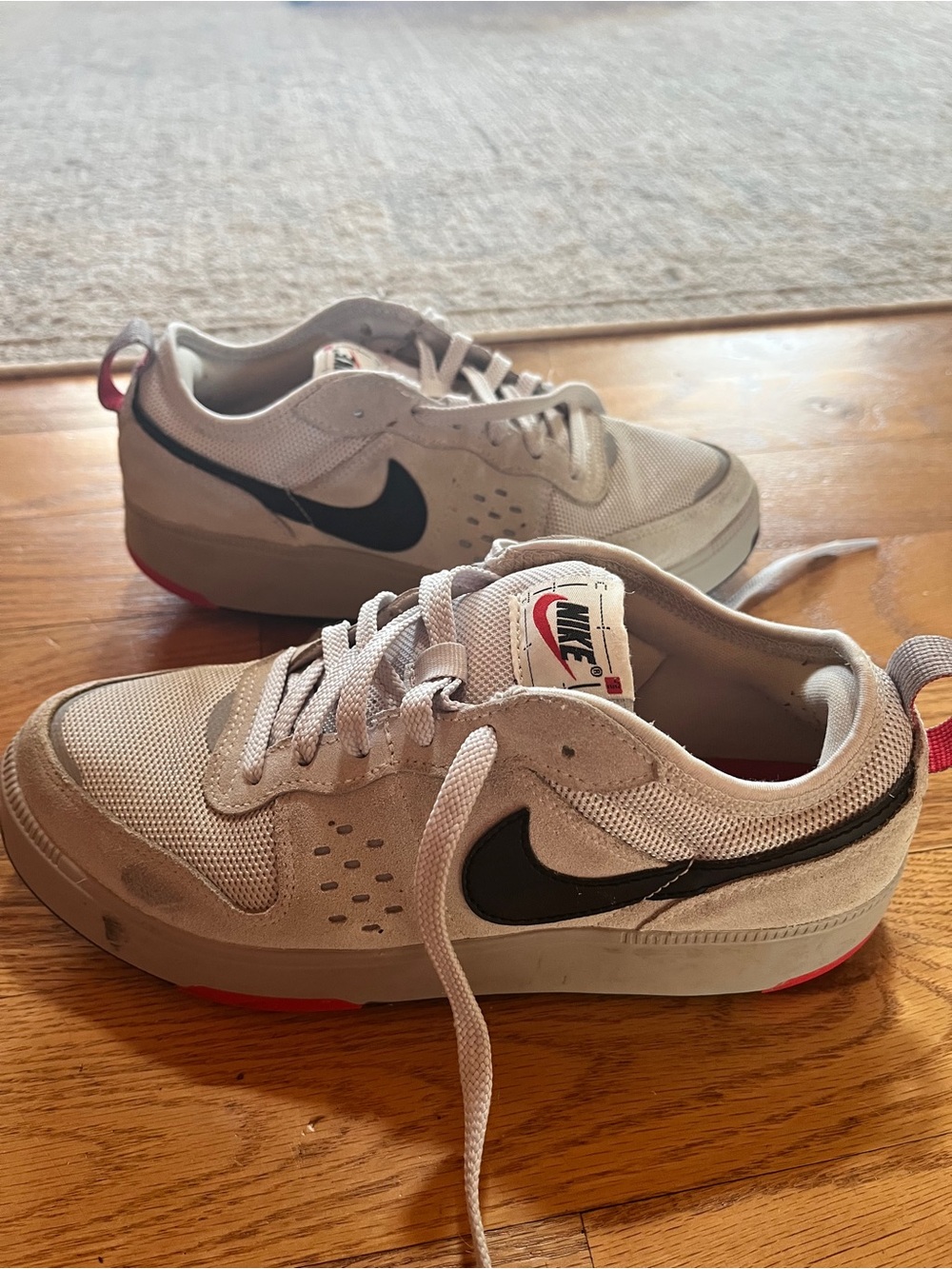 Nike Kids Light Gray and Black Low-Top Sneakers with Red Accent